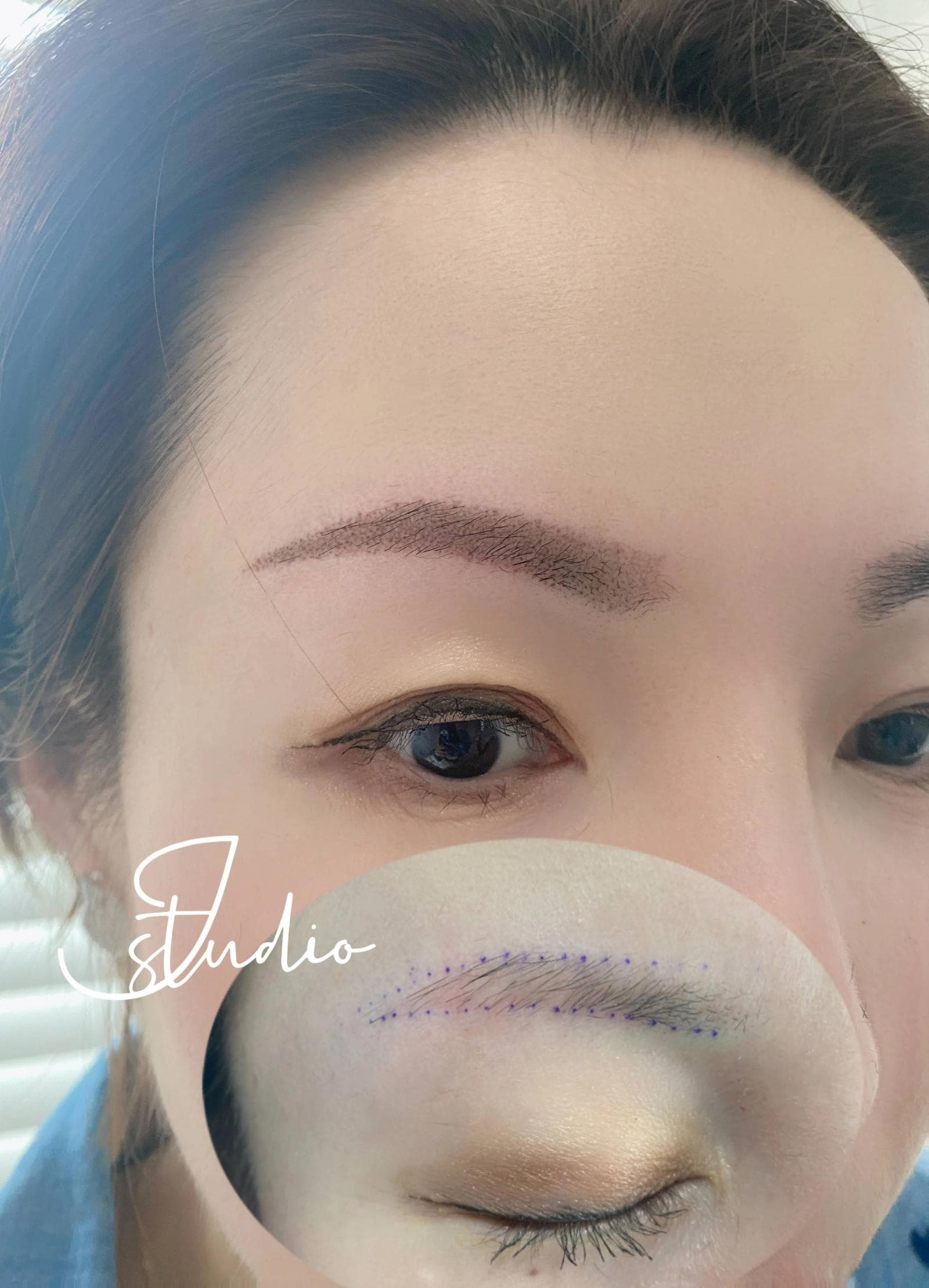 Close-up of finished eyebrow tattoo result